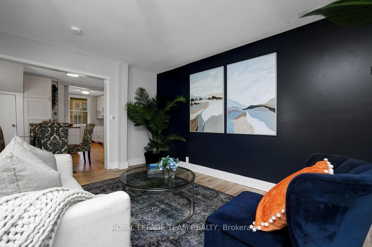 Living area with navy accent wall.