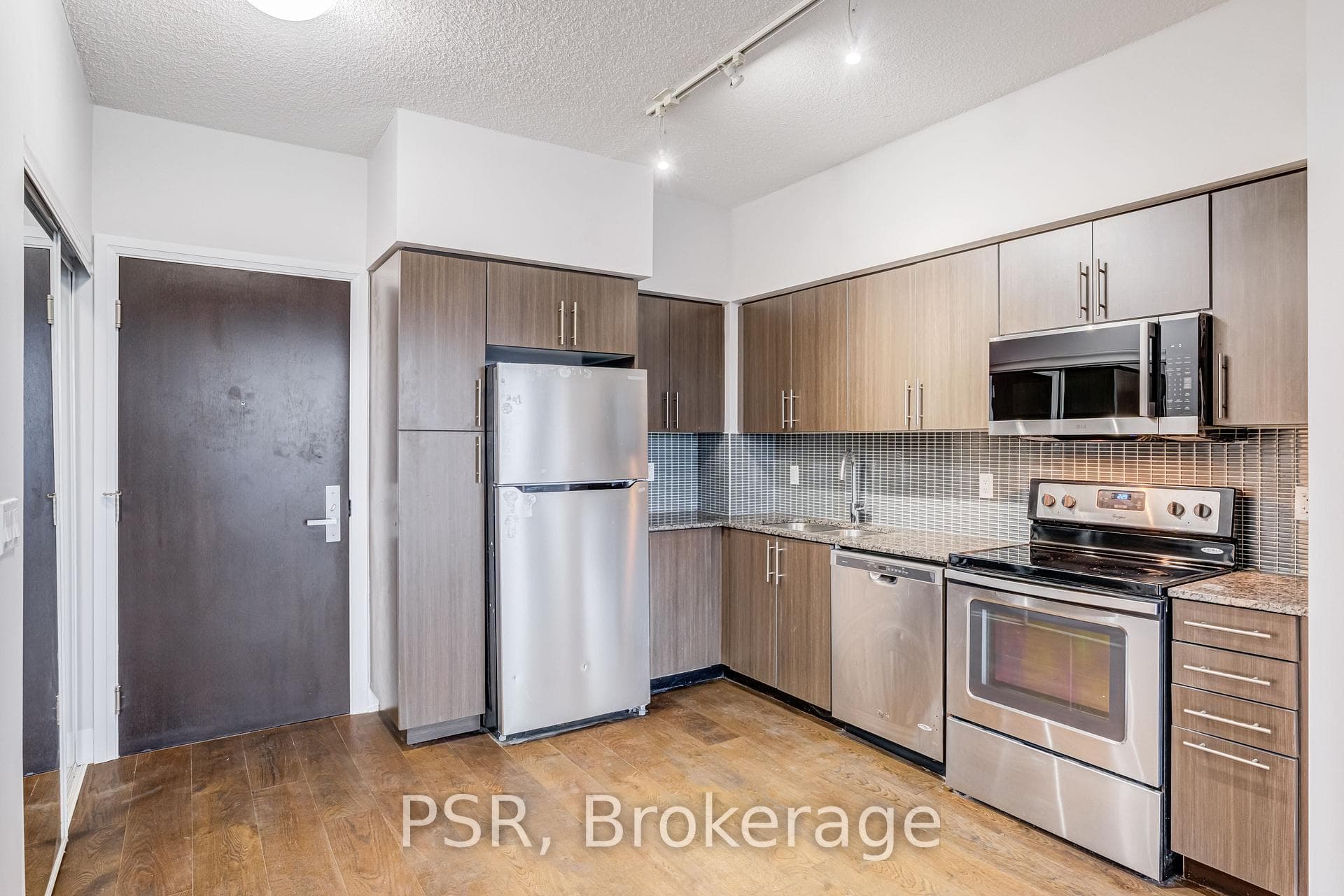 Kitchen w/ Stainless Steel Appliances