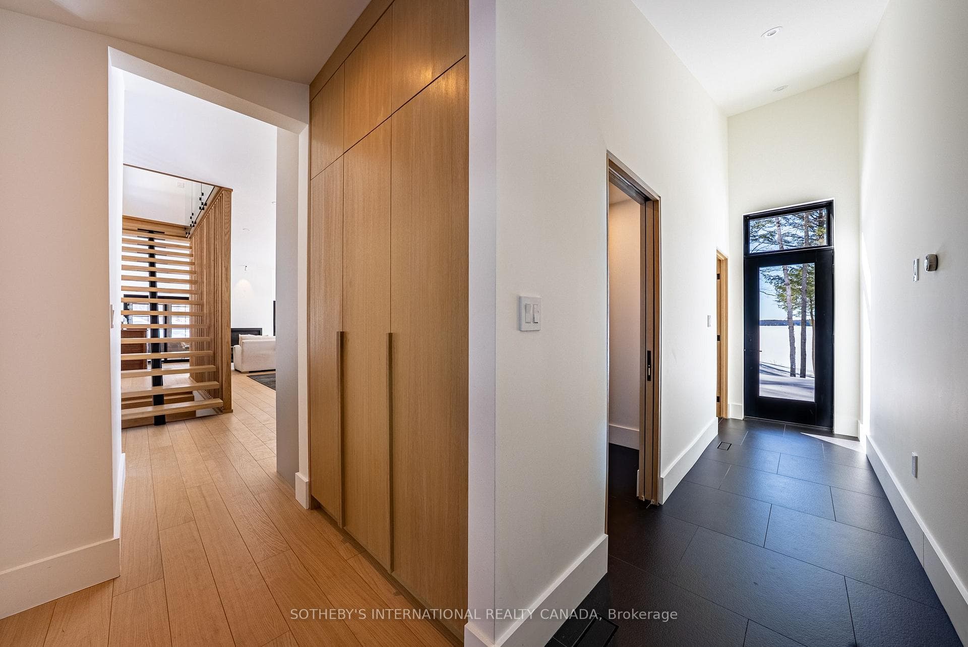 hall with laundry, powder room and access to outsi