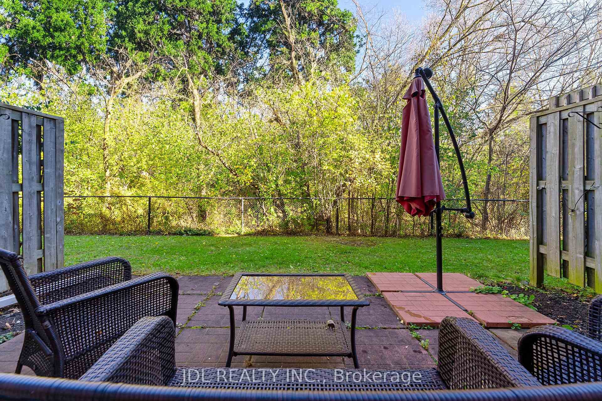 Proper grass & patio backyard with gorgeous ravin