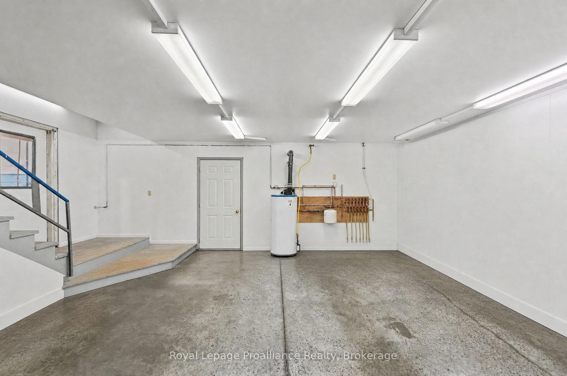 Utility Room with Stairs to Mezzanine