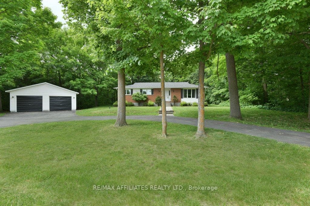 Paved, horse shoe shaped driveway.