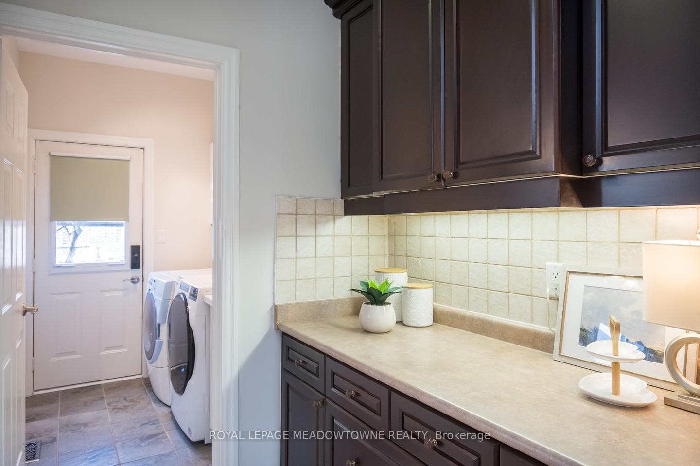 Main Floor laundry with backyard access