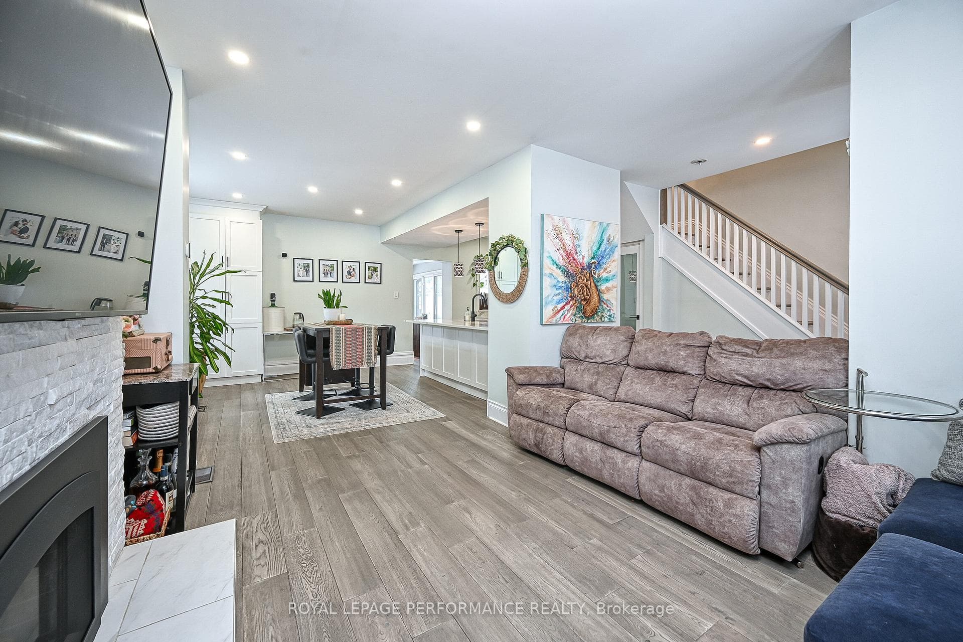 Living Room open to casual dining area and Kitchen