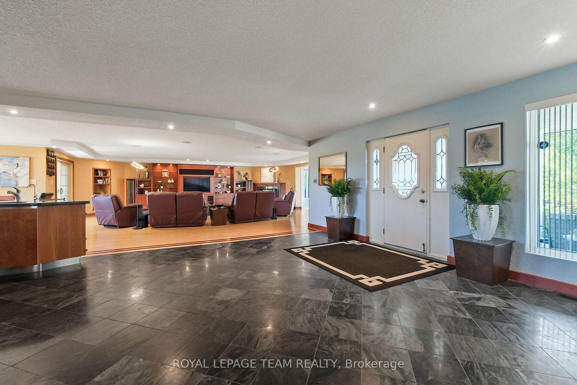 Large tile foyer welcomes you upon entry.