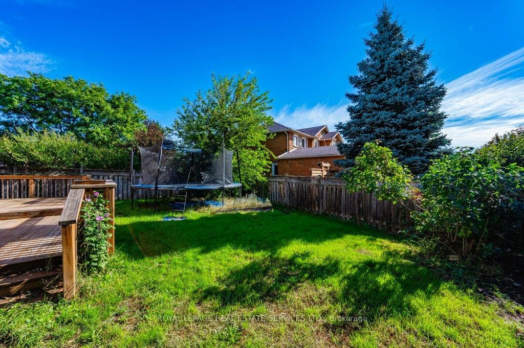 Fully Fenced Back Yard w/Expansive Tiered Deck