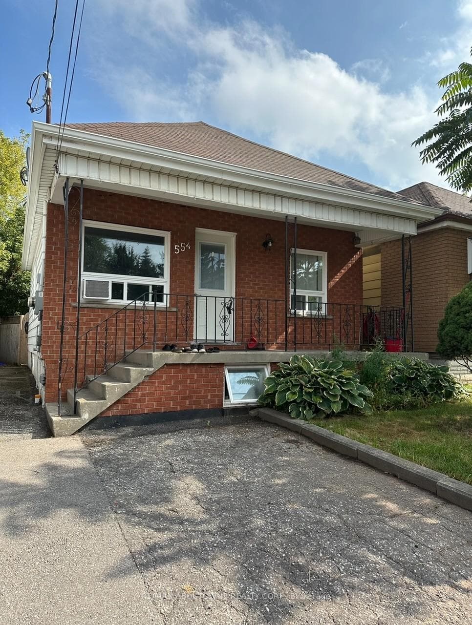Front View of house with one car driveway parking