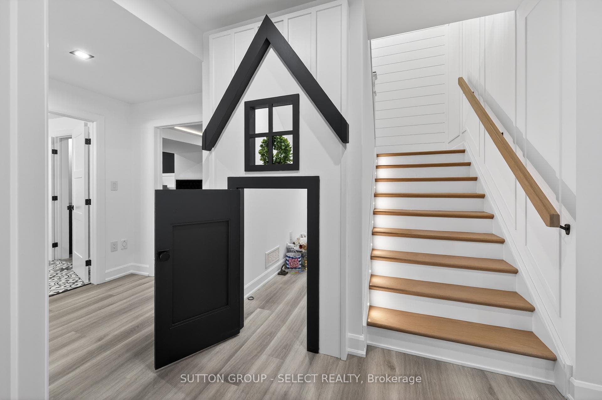 Stairs down into lower; custom play house