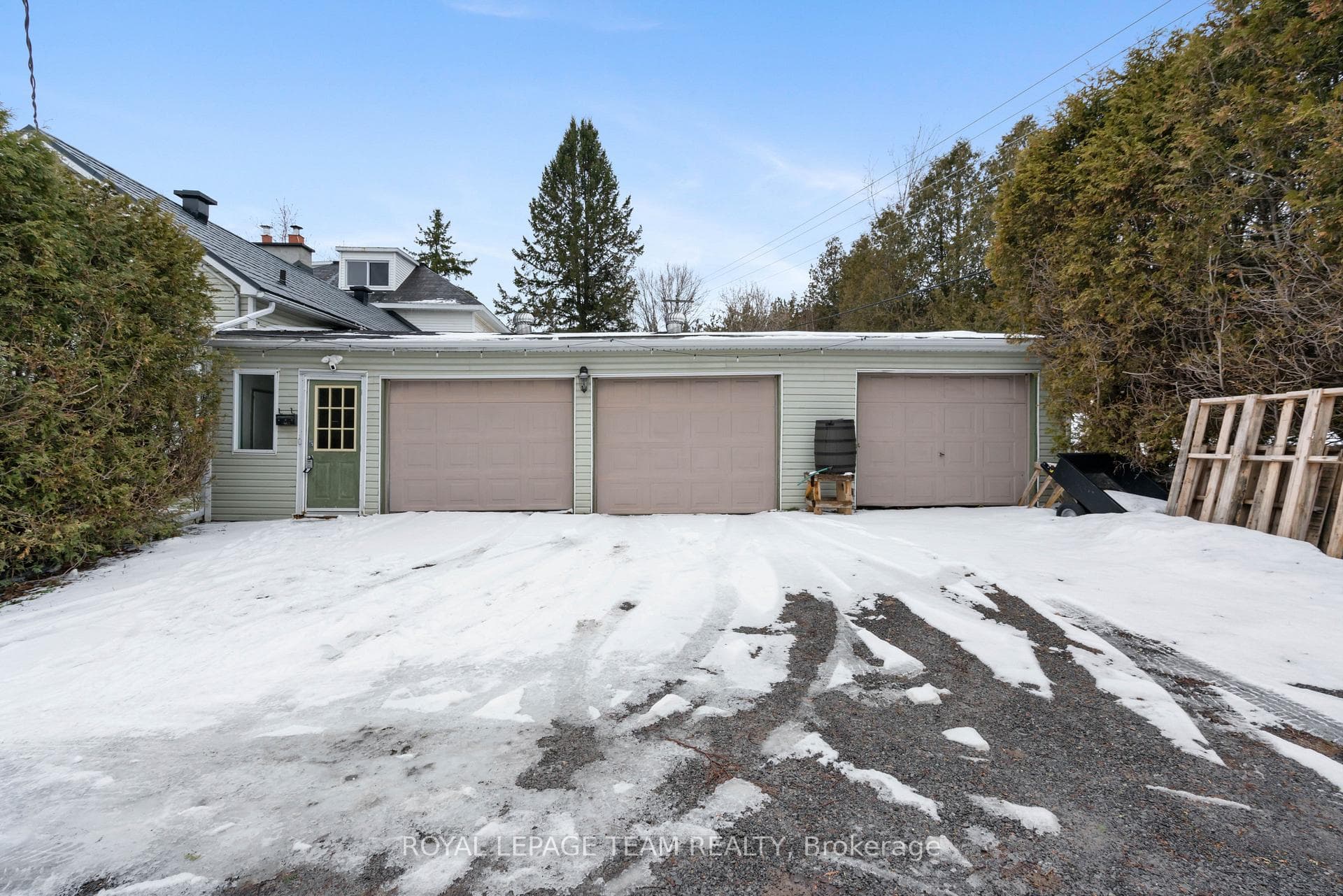 Triple car attached garage