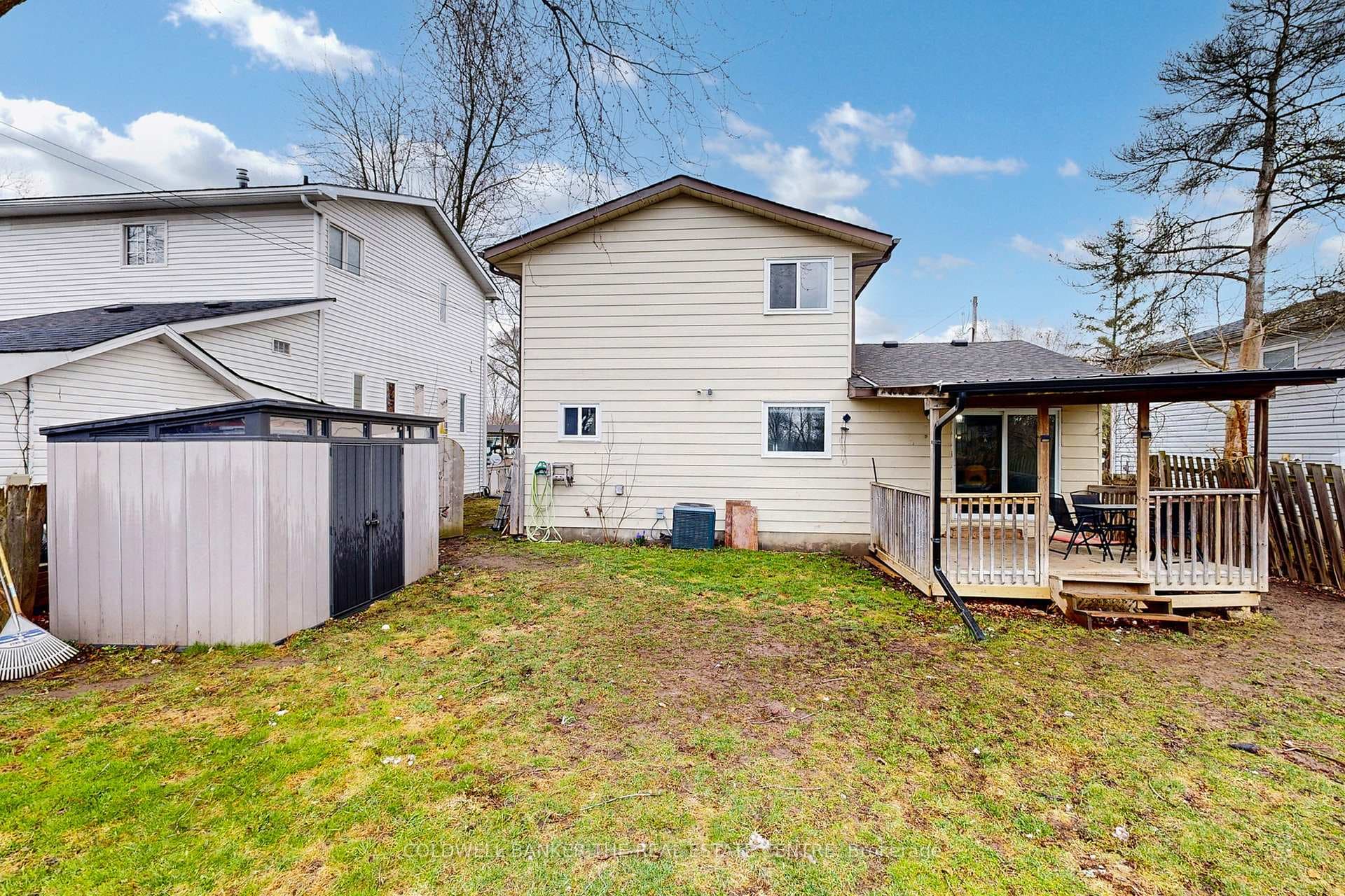 Fully fenced and gated lot with garden shed