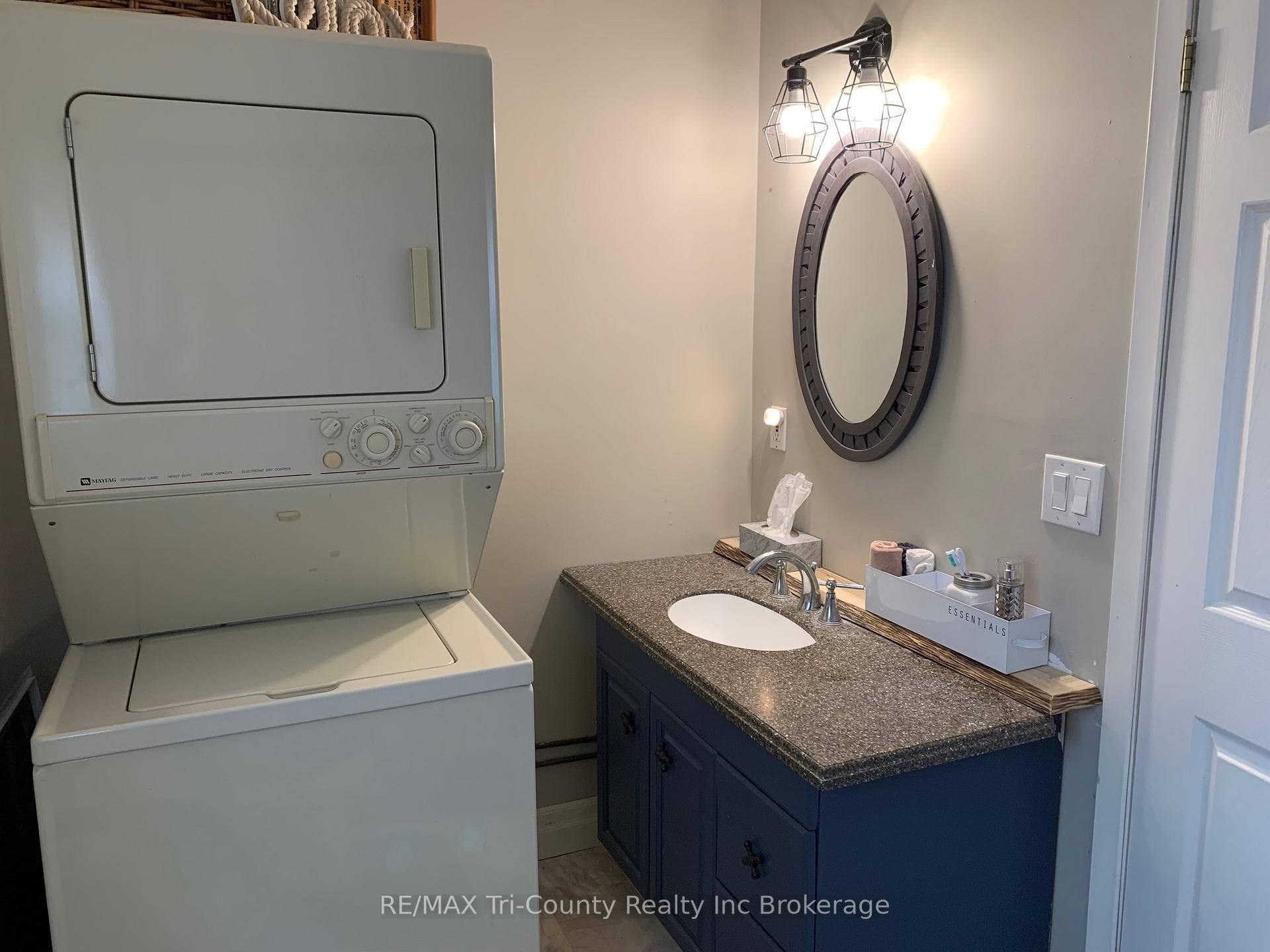 Bathroom with stackable laundry