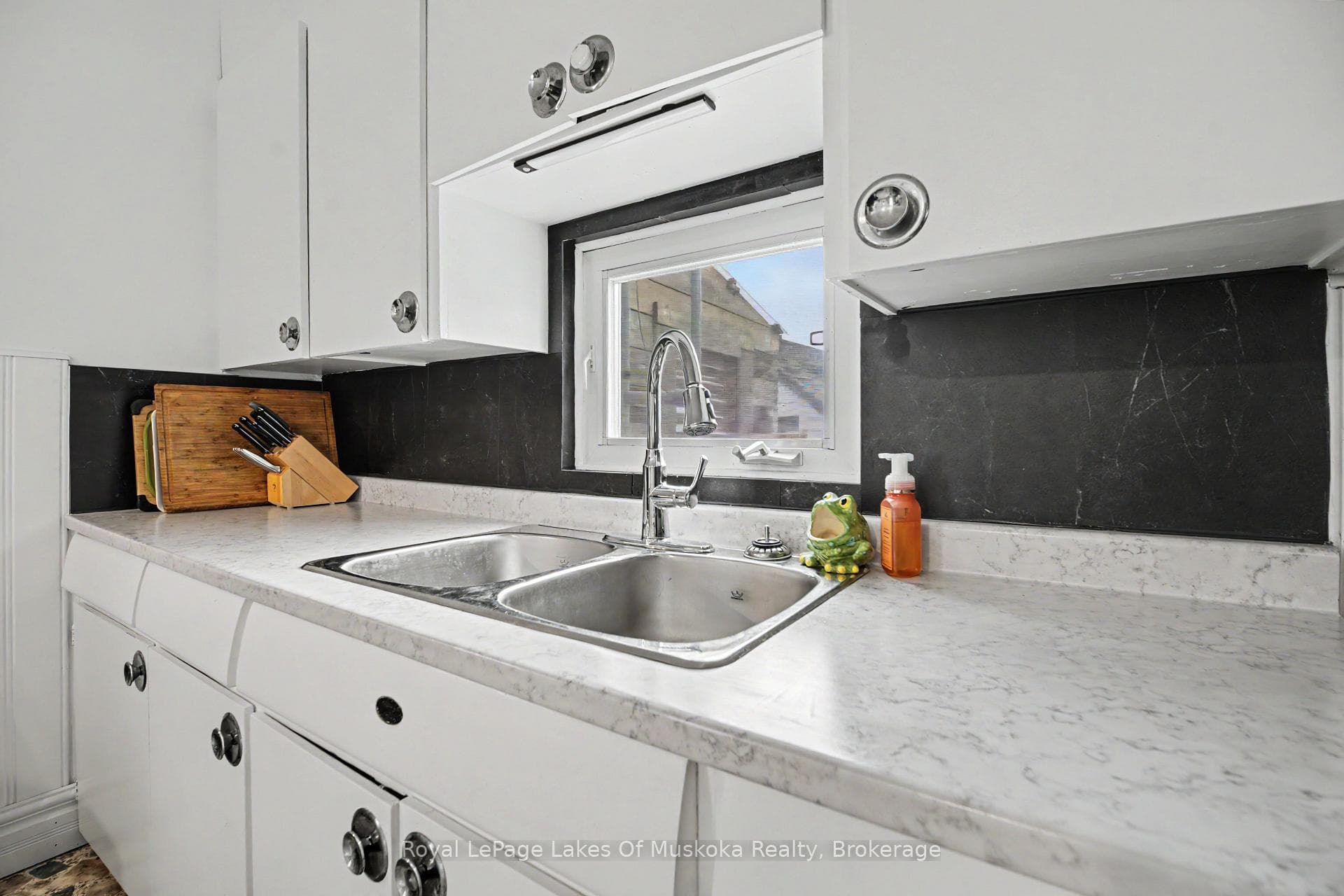 Kitchen, with walkout to the backyard