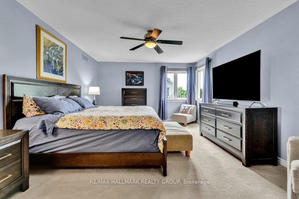 Master retreat with beautiful corner windows.