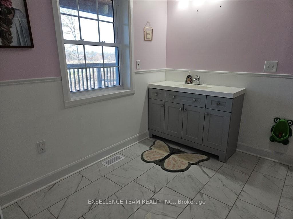 Different angle photo of main floor bathroom.