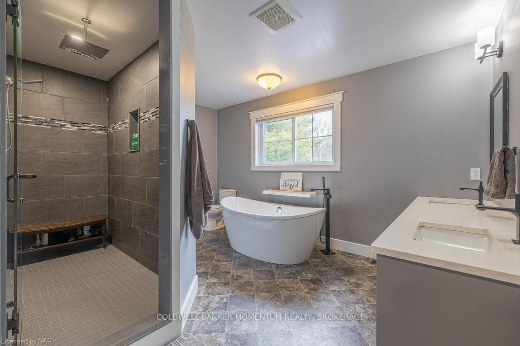 Stunning soa-like master bath with rain shower hea