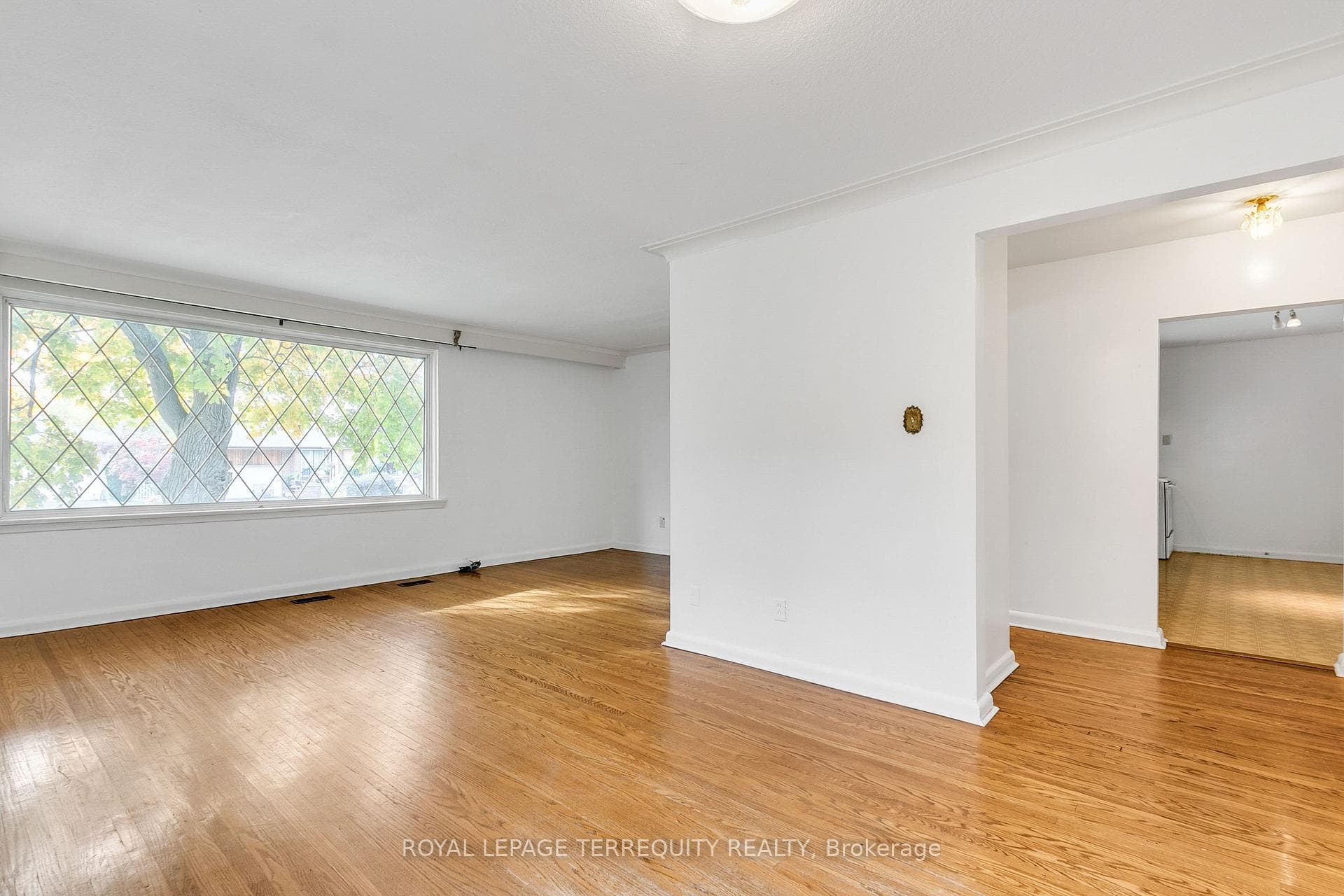Living and Dining Room Overlooks Kitchen