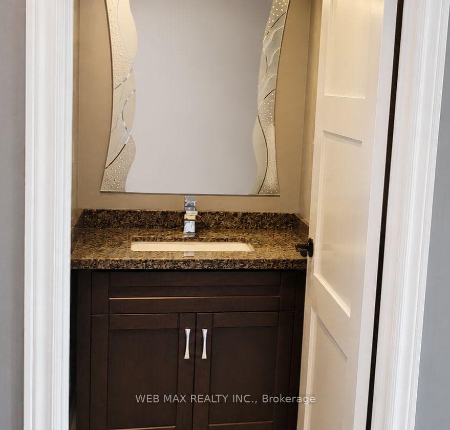 Updated powder room on main floor off of foyer