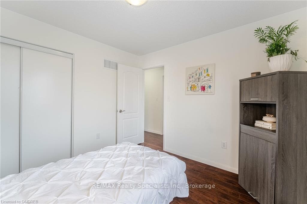 Bedroom featuring dark hardwood / wood-style floor