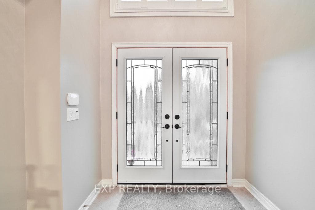 Grand front foyer with vaulted ceiling
