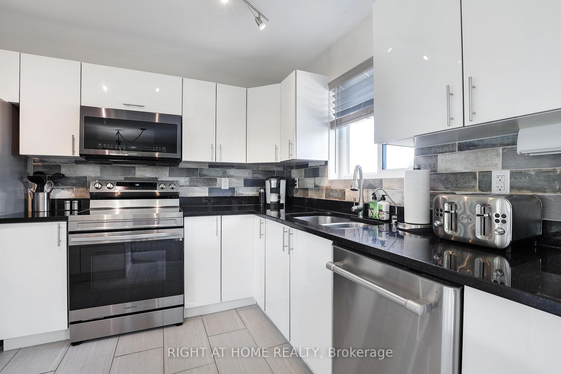 Kitchen overlooking backyard