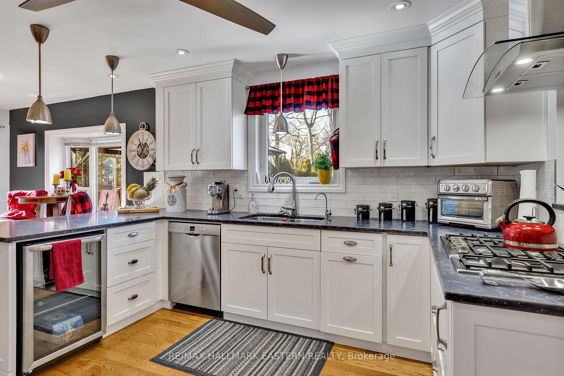Gas cook top with stainless steel range hood