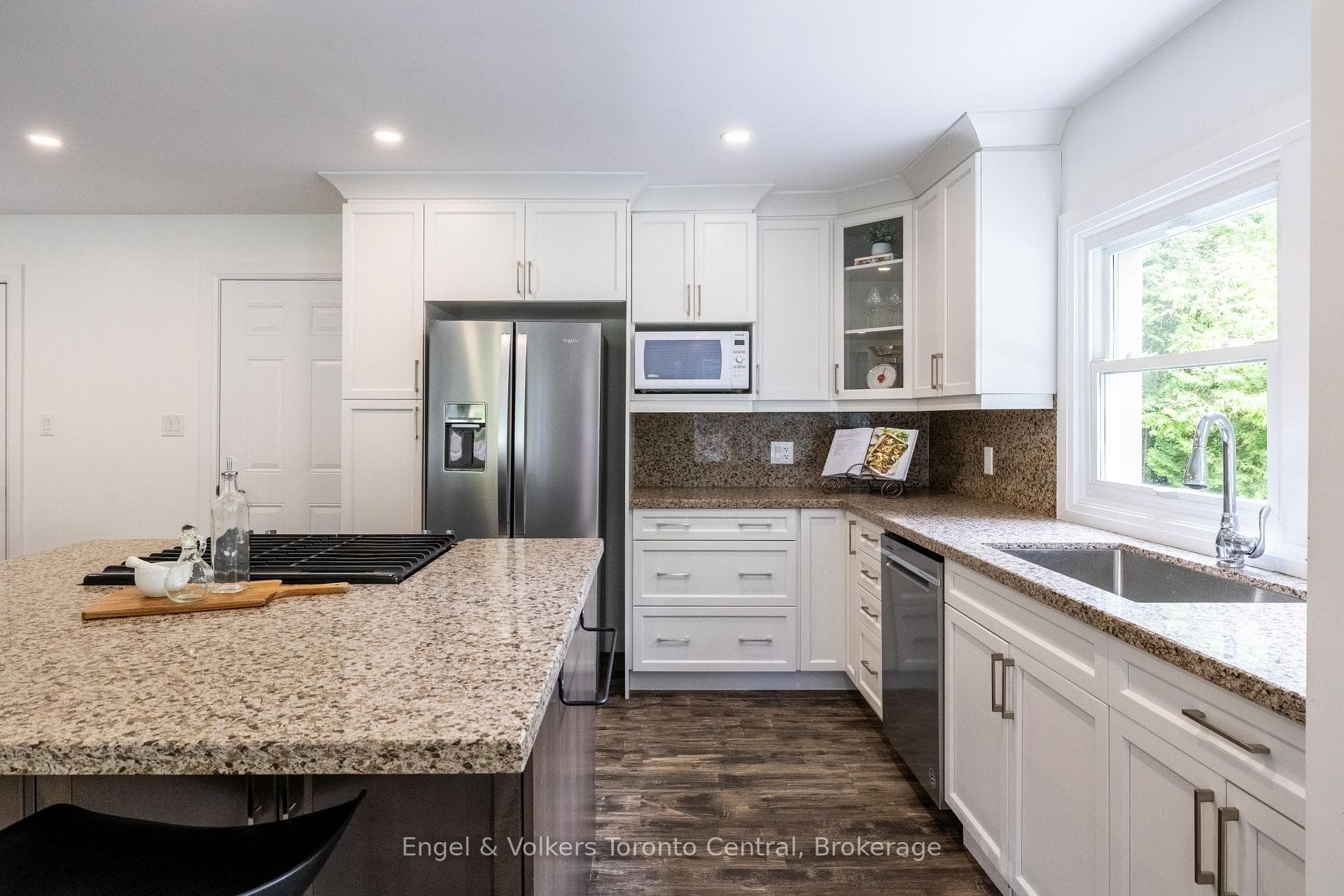 Modern kitchen with granite countertops, ...