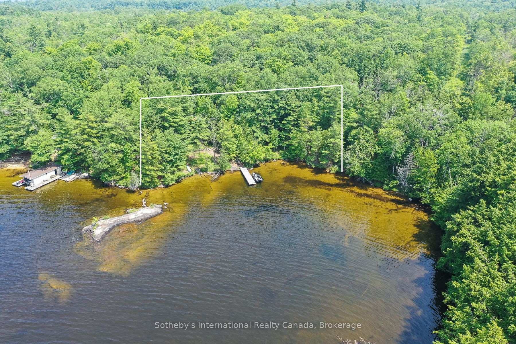 Approx., property boundary - cottage + vacant lot.