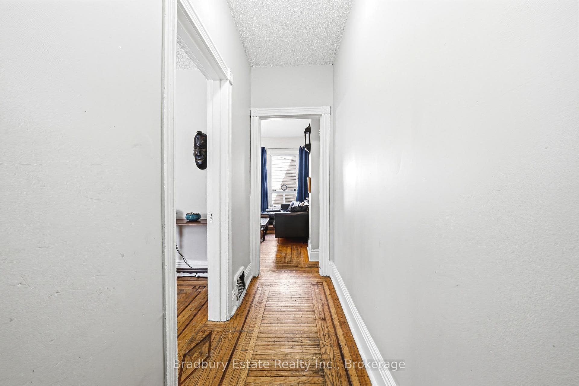 Hallway and Main Level with Inlaid Hardwood