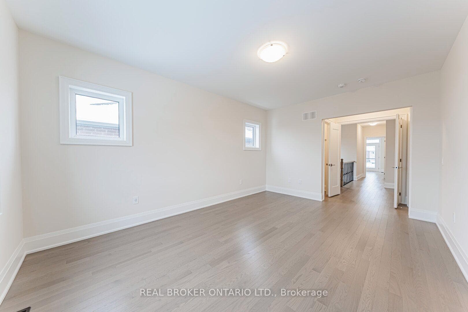 Primary Bedroom w/ Double Walk-in Closets