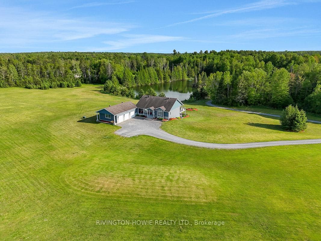 Custom Bungalow on 27 manicured acres.