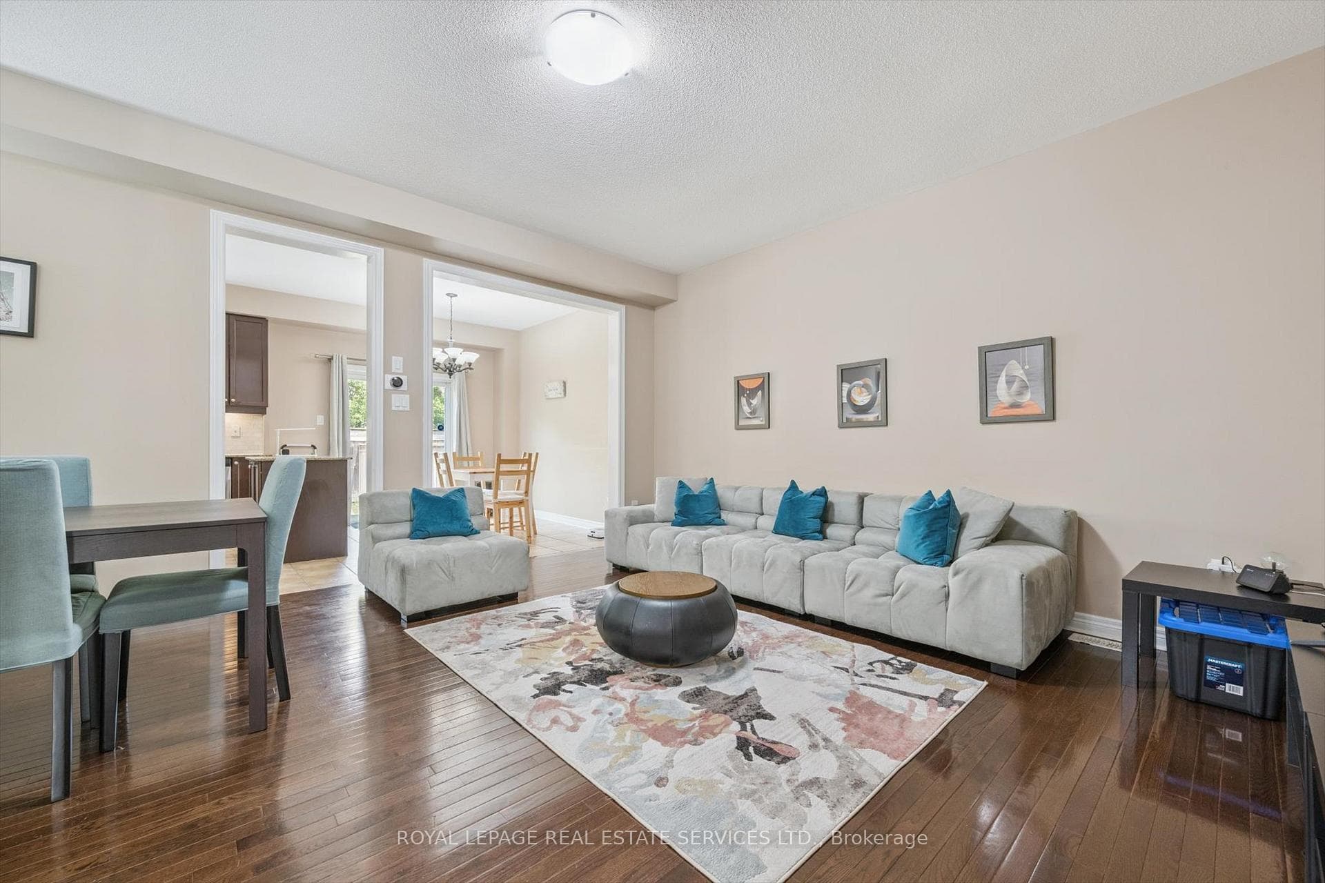 Spacious Living/Dining Area with Hardwood Flooring