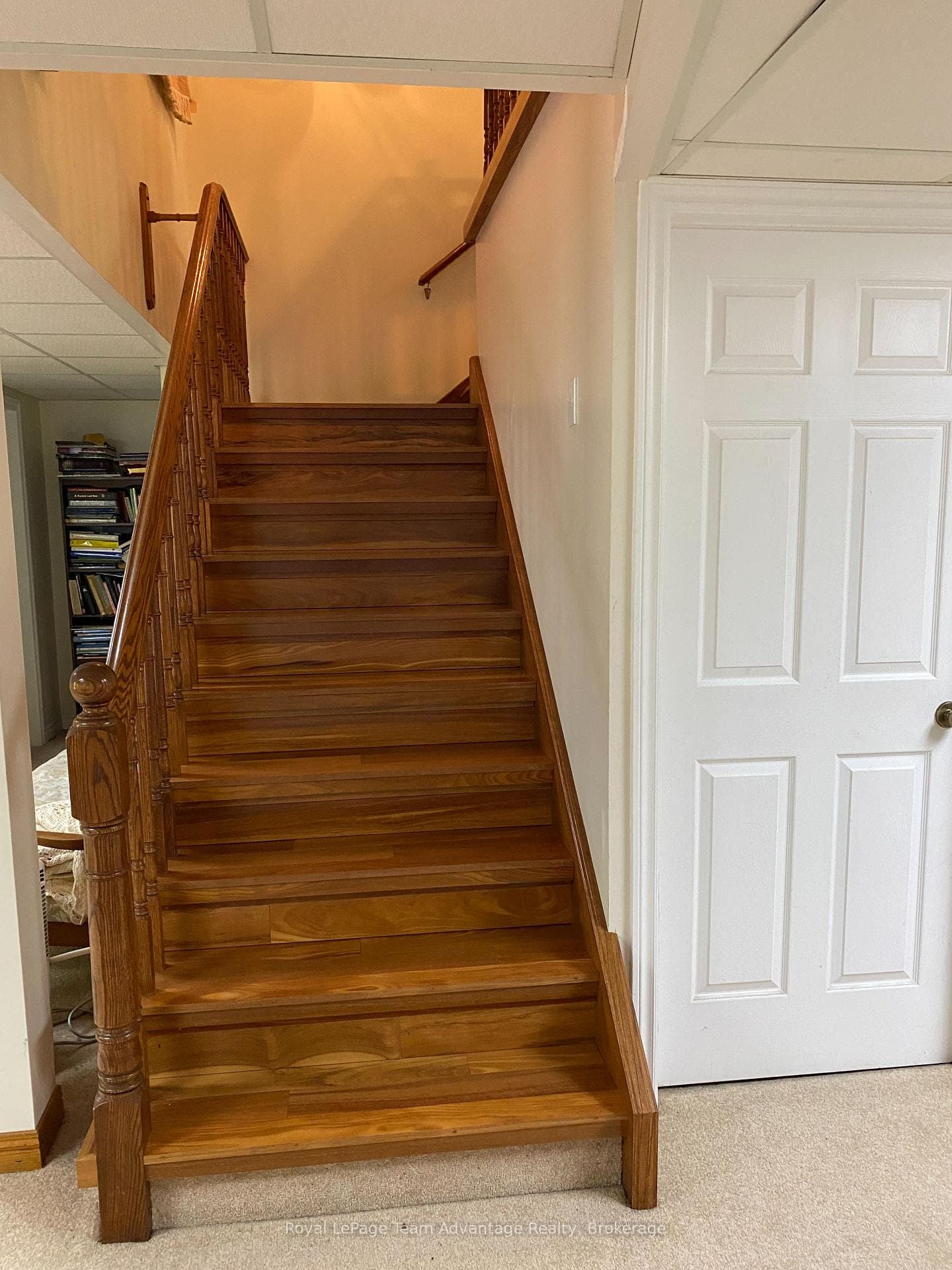 Beautiful staircase leading to the lower level