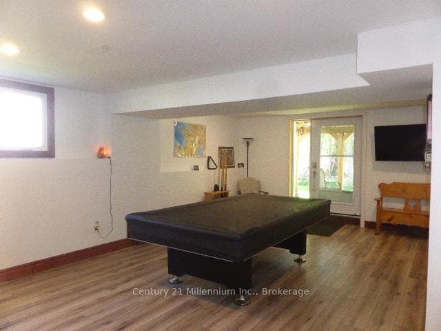Wide glass walkout to lower patio