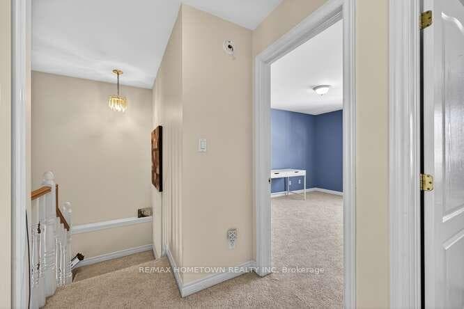 Hallway from staircase to second level