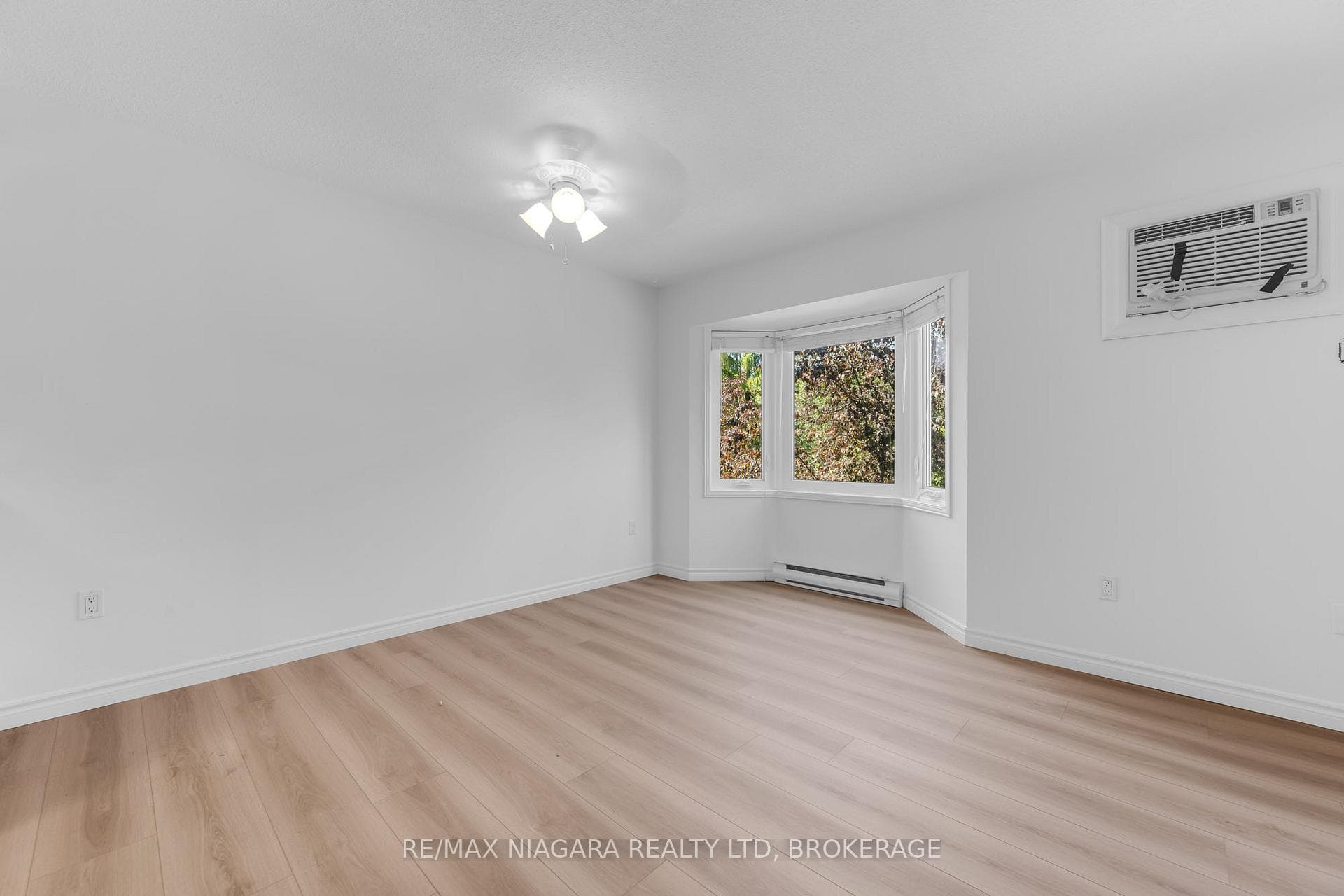 Photos are from another 2 BR unit in same building