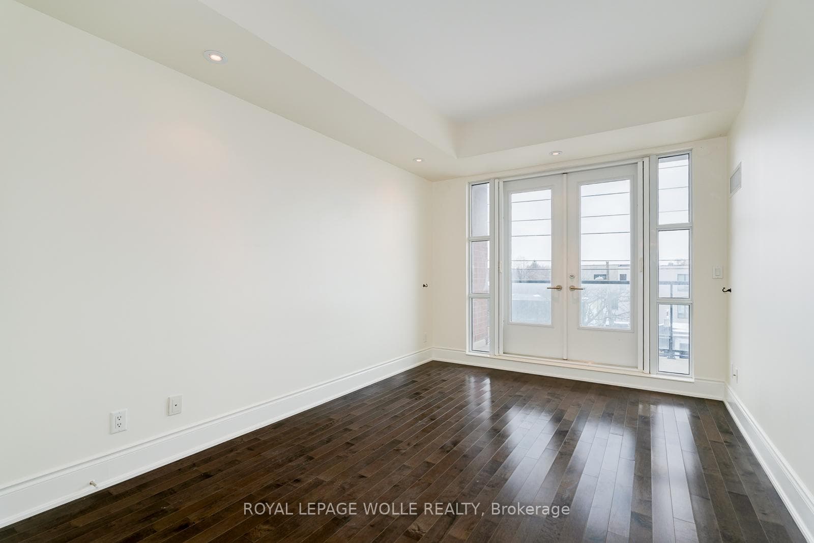 Bright Primary Bedroom with Walkout to Balcony