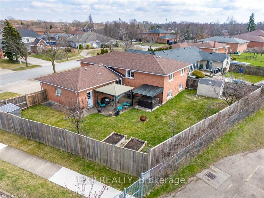 fully fenced back yard, 2 sheds, gazebo, hot tub,