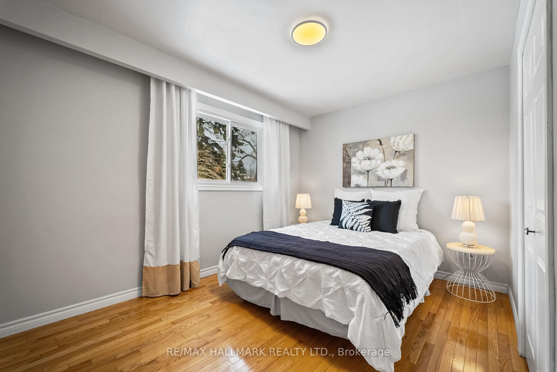 2nd Bedroom hardwood large closet overlooks backyd