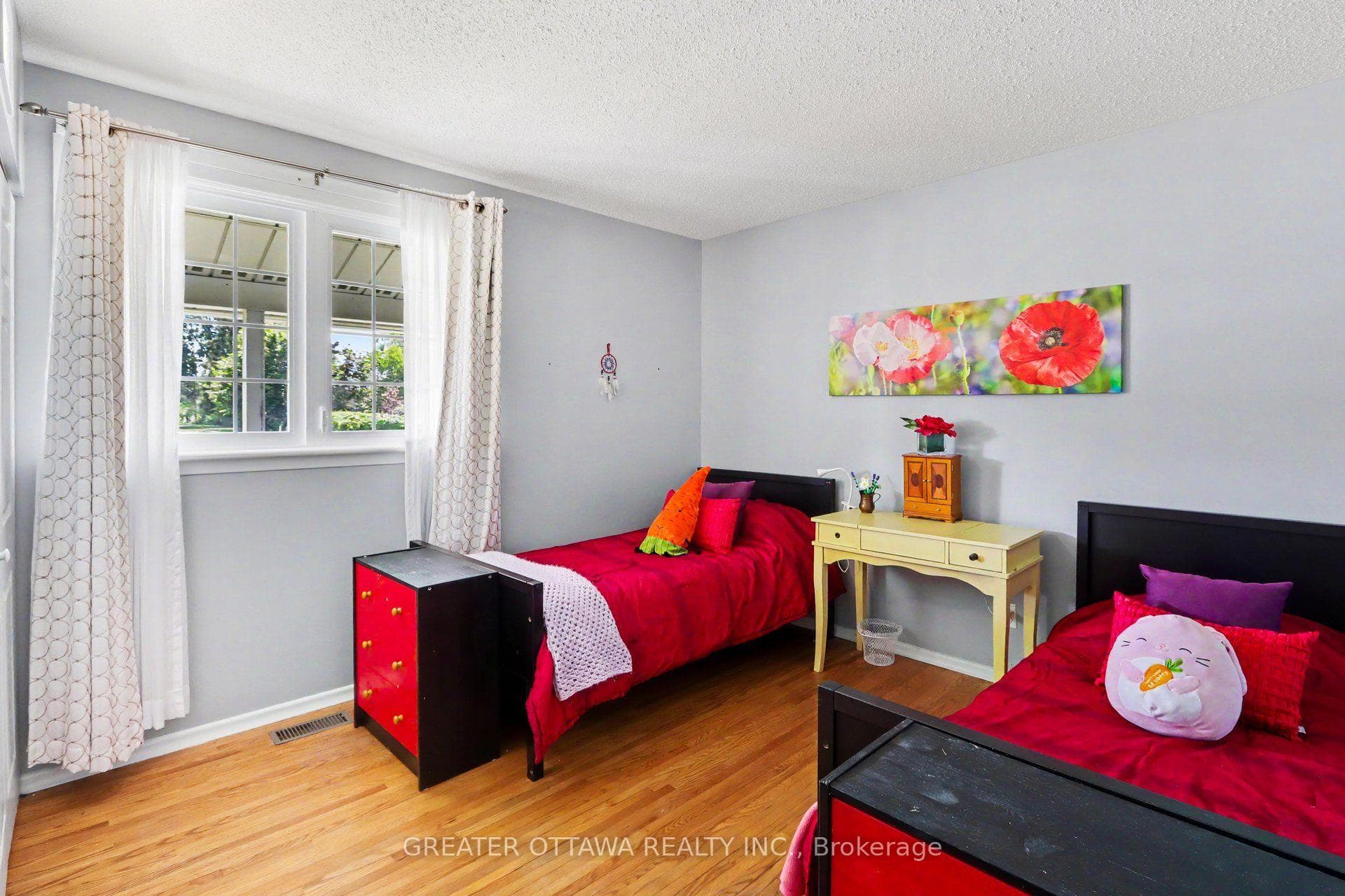 This second bedroom is actually almost 14 by 12 ft