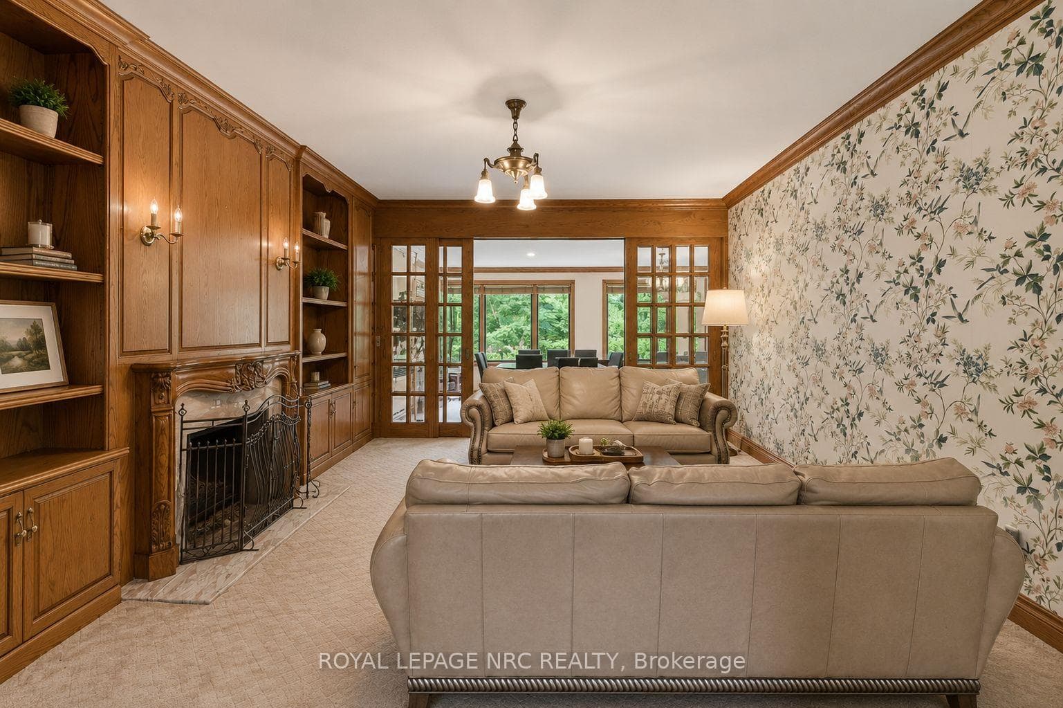 Family room with wood fireplace *virtually staged