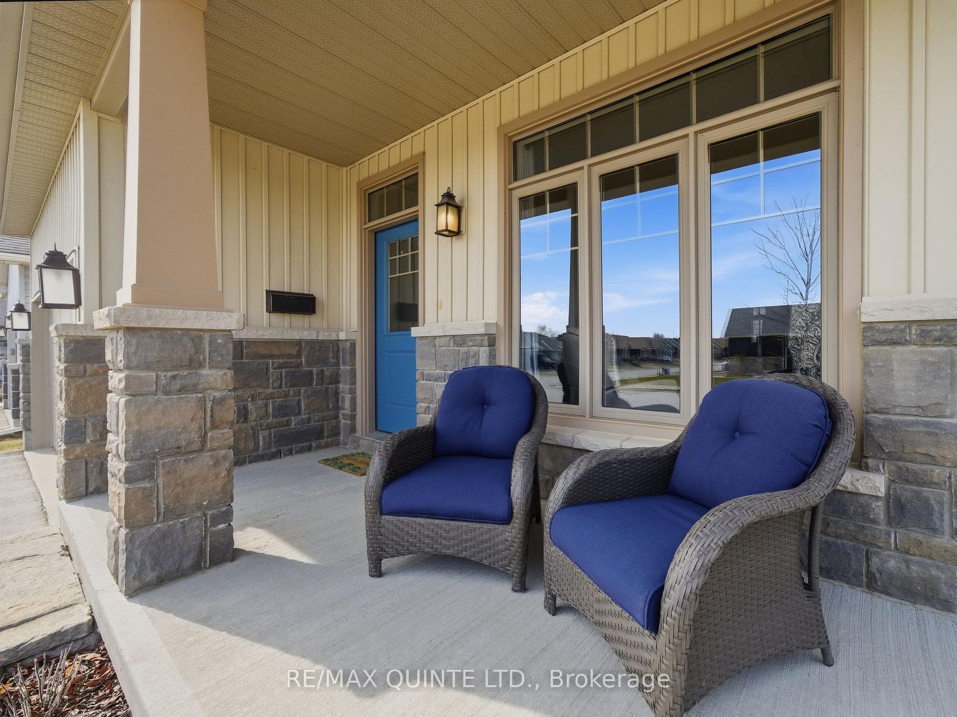 Cozy porch seating to watch the world go by.