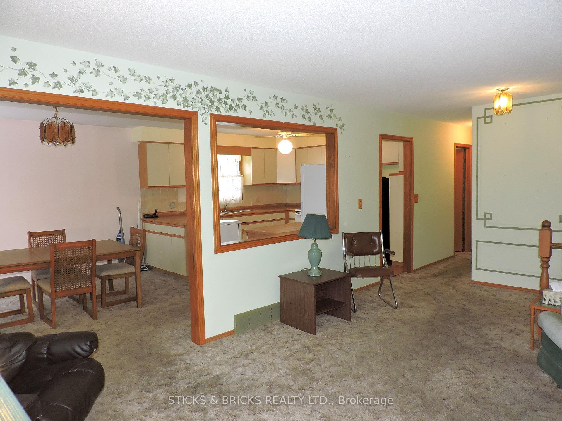 VIEW TO DINING ROOM AND KITCHEN