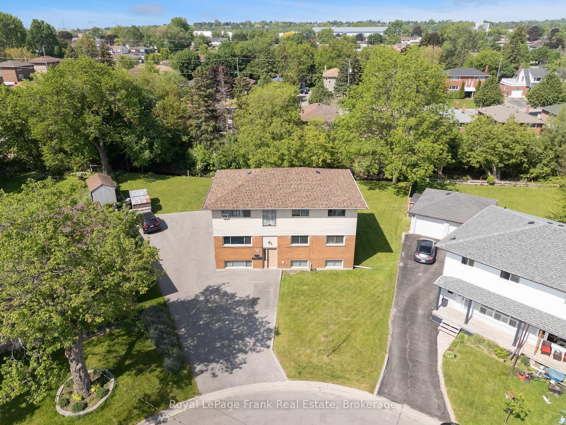 Triplex on large pie shaped lot