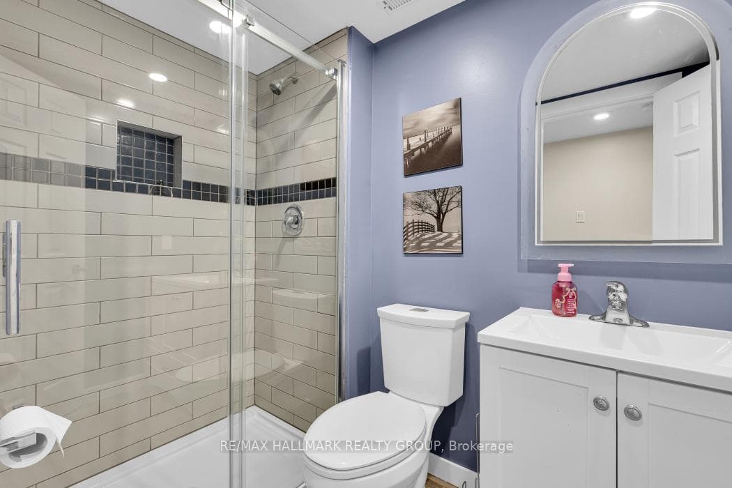 Glass enclosed shower.