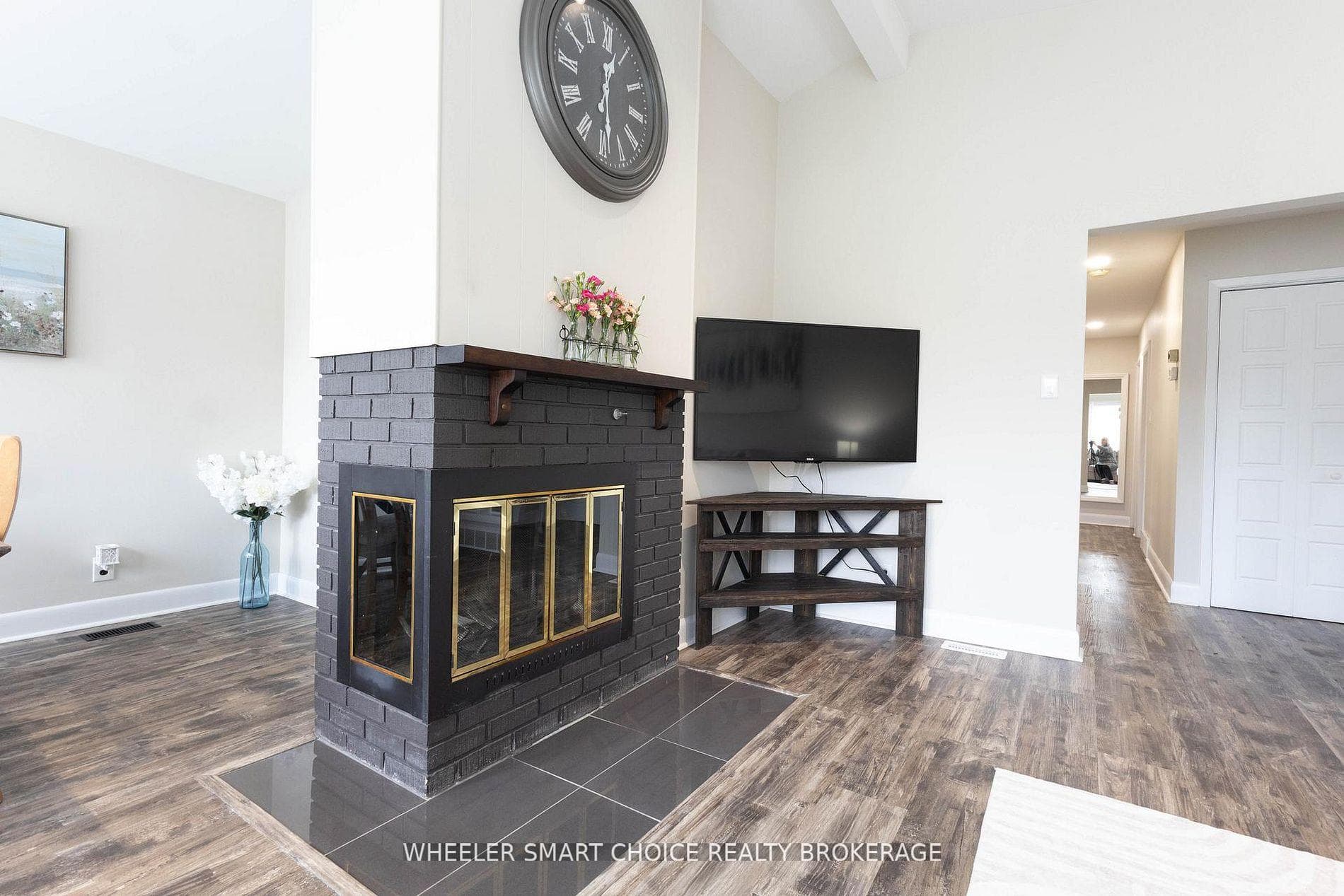 A fireplace offers a view from two sides