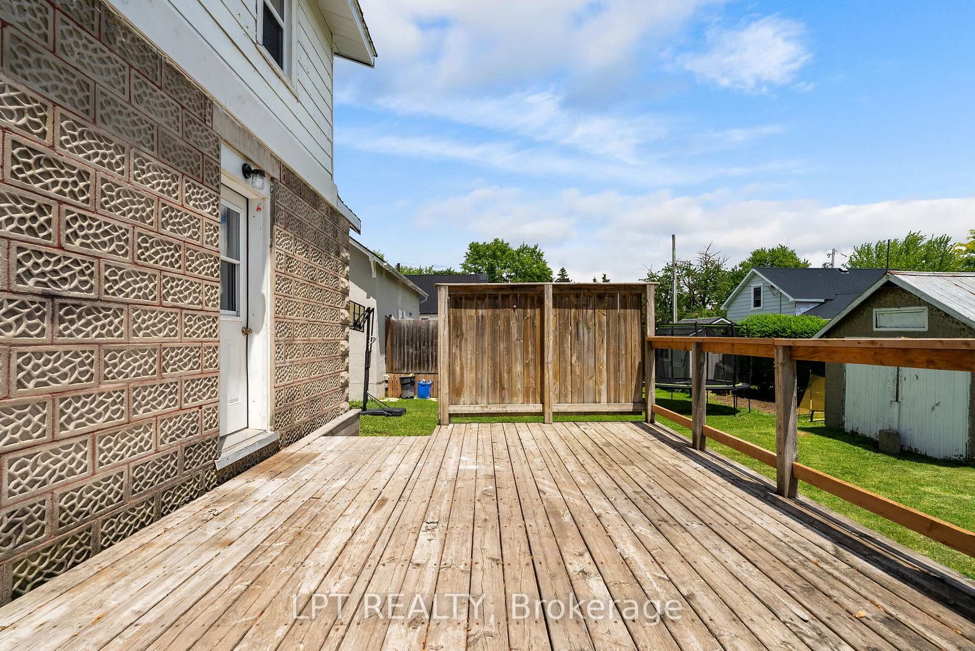 Sun deck to the back yard.