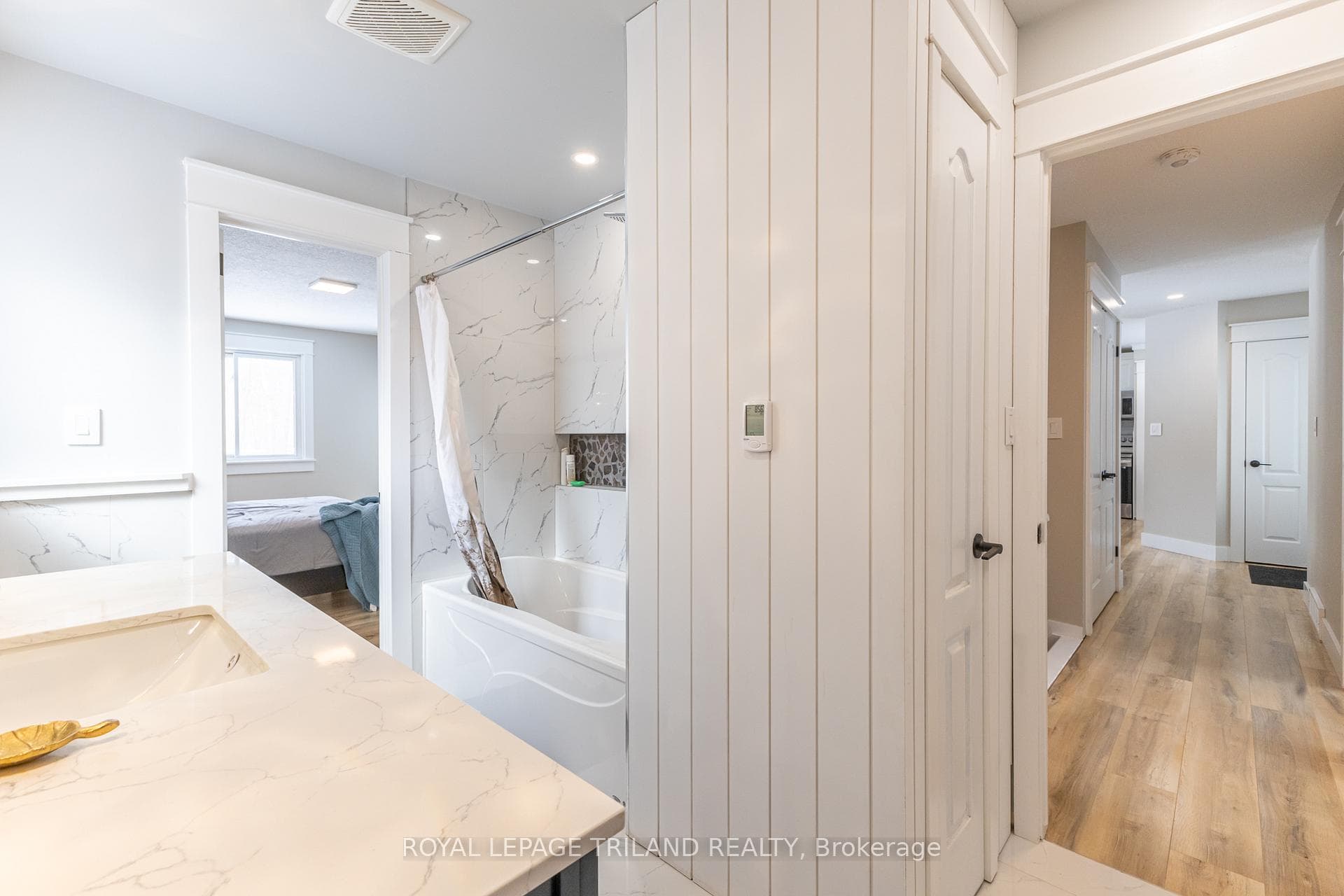 Showing both entrances to cheater ensuite bath