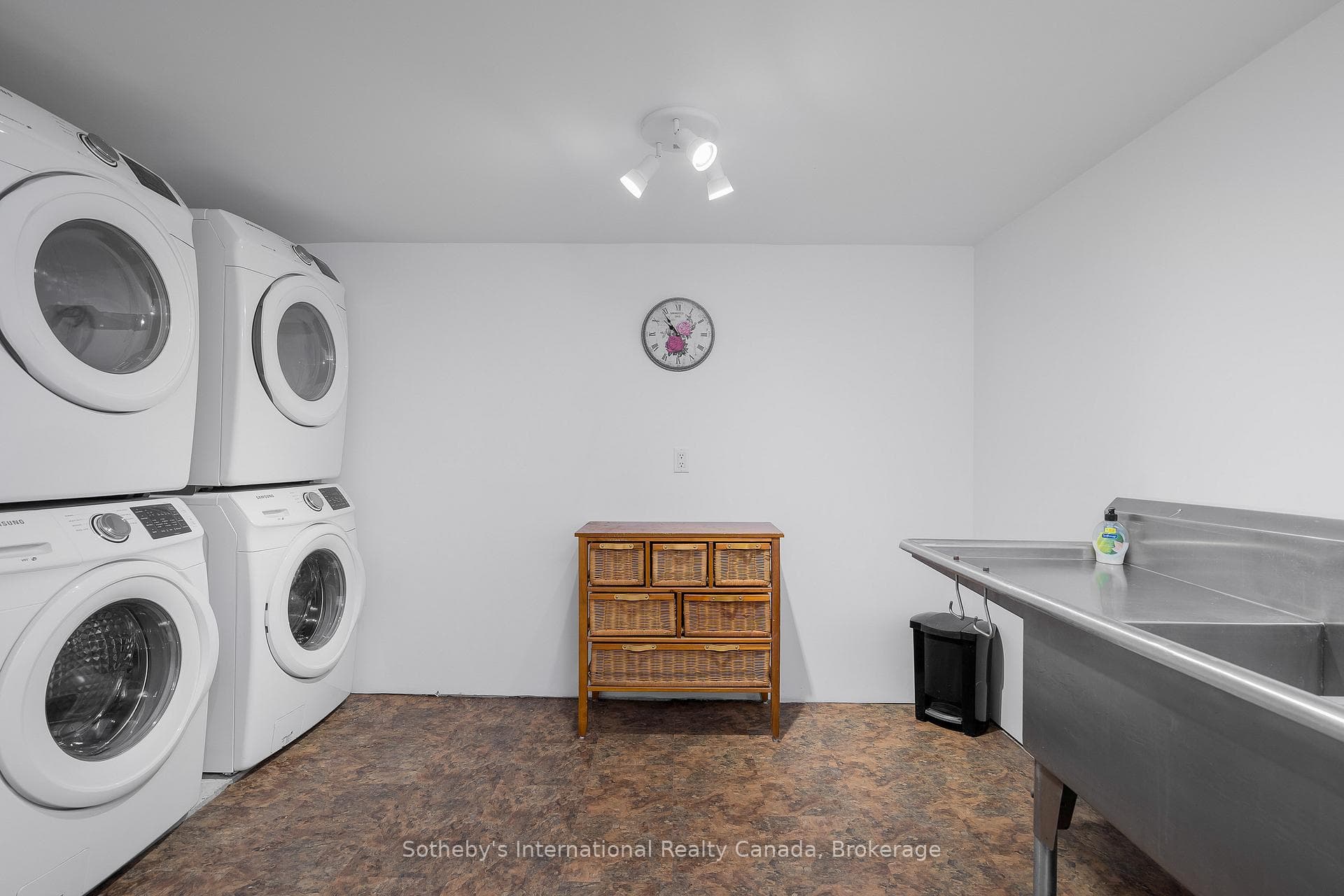 Lower Level Laundry Room with Dual Washer & Dryers