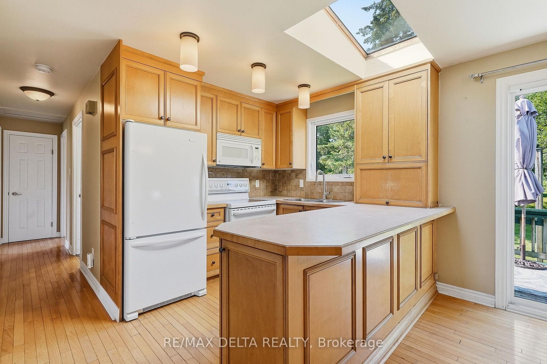 Kitchen appliances included.
