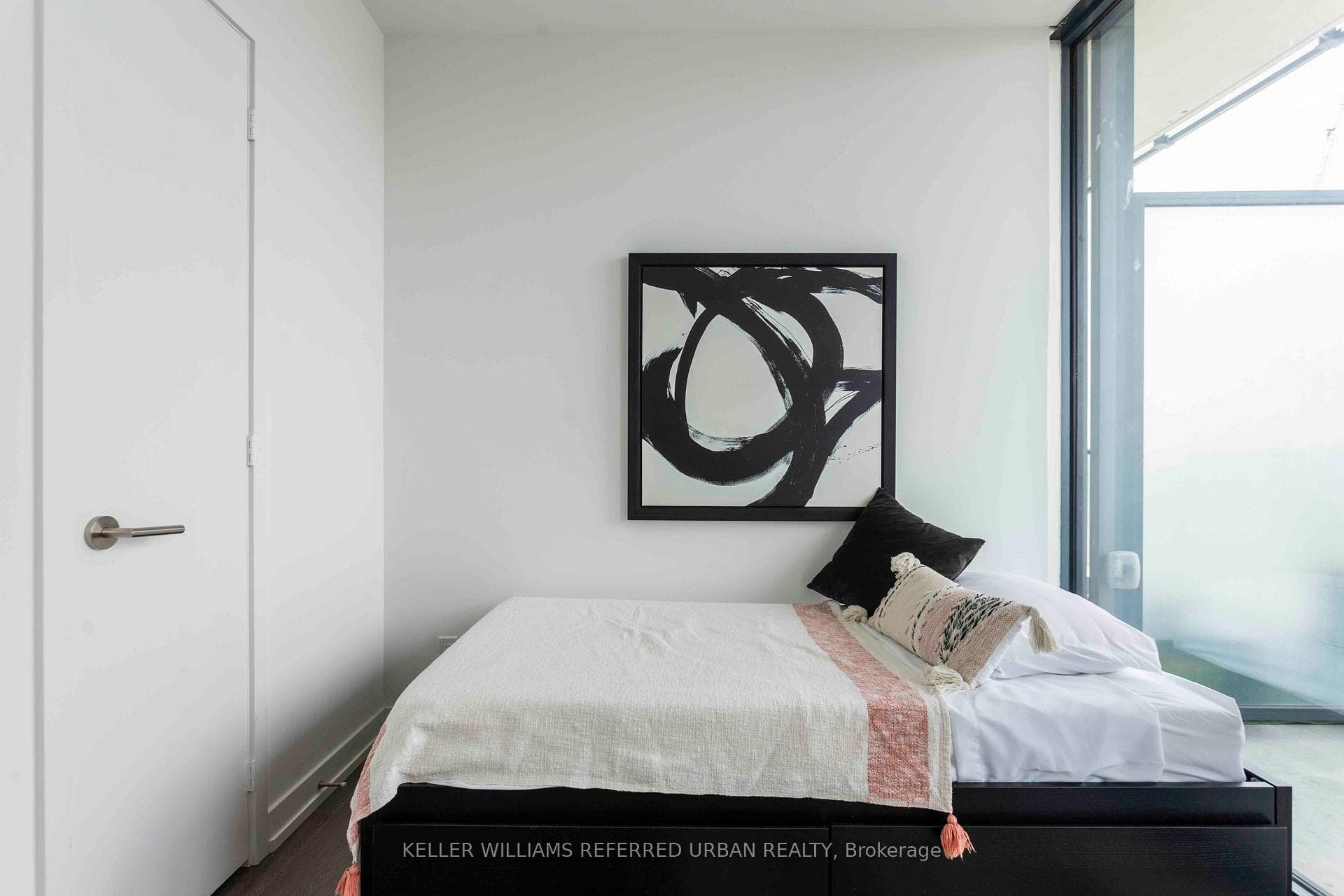Closet and Floor-to-Ceiling Windows